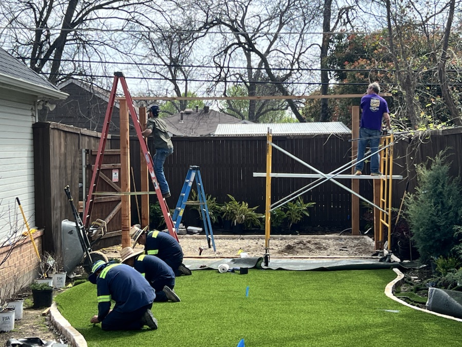 AJS Elite crew coordinating an active outdoor construction site